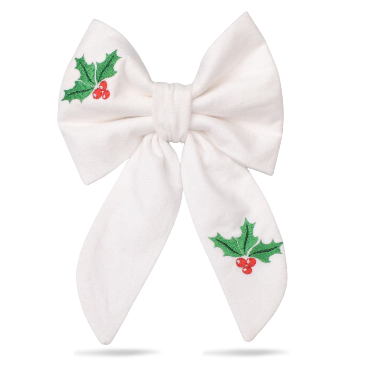A white bow with green holly leaves and red berries embroidered on it.