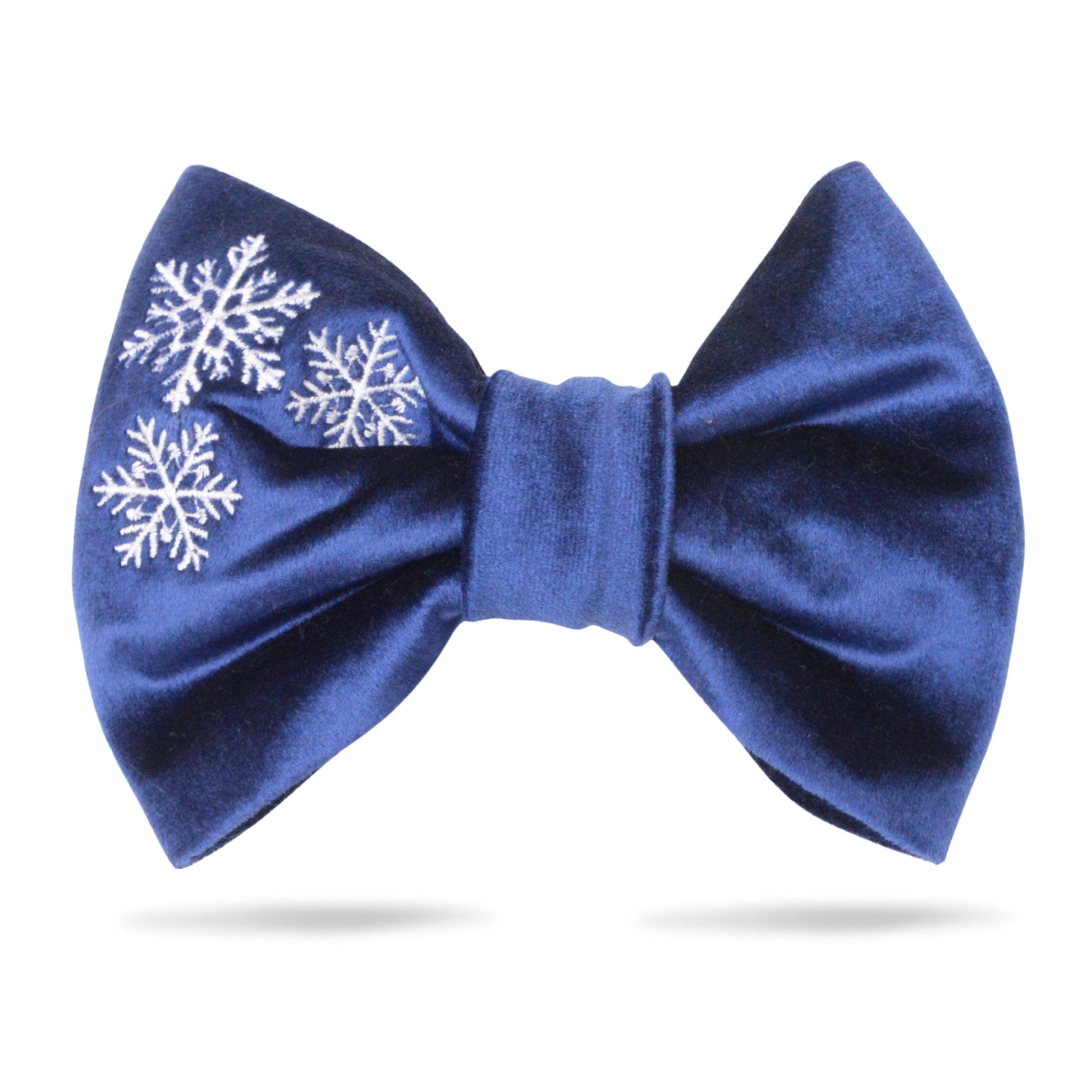 A blue satin bow tie with white snowflake embroidery on the front.